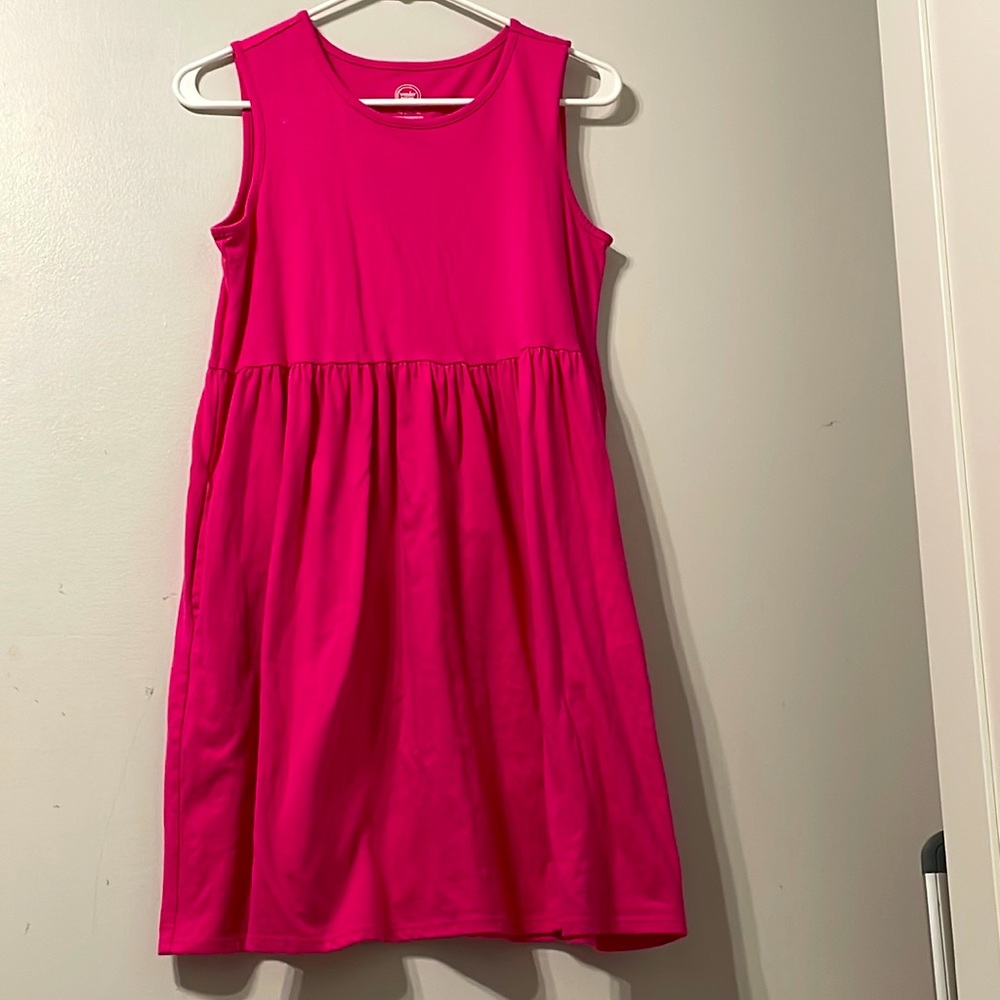Knee length pink dress. With a crinkle bottom